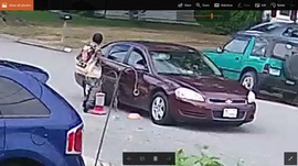 Suspect opening door of get away car